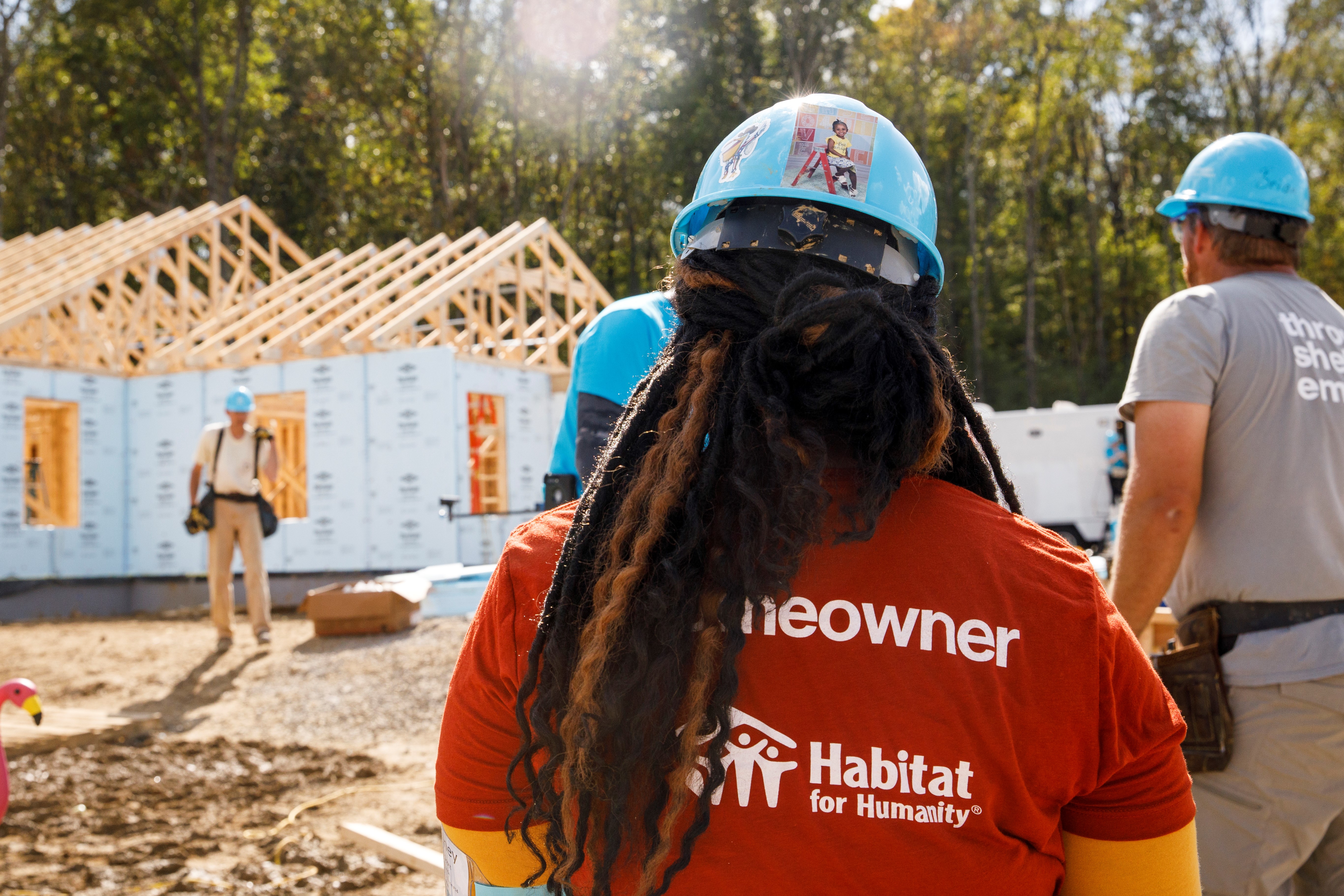 Habitat Homeowner Brittaney working alongside volunteers at Jimmy Carter Work Project